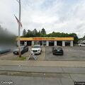 Report of illegal dumping behind tire shop