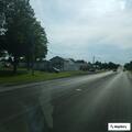 Vehicle and lawnmower crash with minor injury