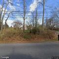 Boulder blocking part of Stratham Heights Road
