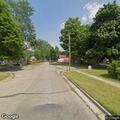 Male falls and injures ribs at 317 West Franklin St