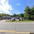 Car hits tree off Route 125 in Brentwood woods