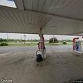 Woman cold and unable to walk at gas station