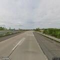 Disabled vehicle and deer on northbound M-53 shoulder
