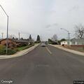 Man found lying on ground near bus stop alert