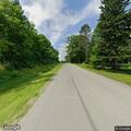 Three-wheeler racing on Spaulding Lake Road
