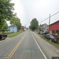 Masked men approach cars in roadway