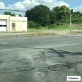 Disabled vehicle at gas station on East Brighton