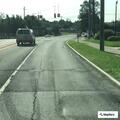Man crawling on sidewalk at Starbucks in Manlius