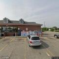 Man selling candy outside Speedway store