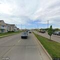Loose dog running in road on Miller Parkway