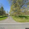 Unconscious person with faint breathing at Wilbur Road