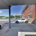 Alarm sounding at car dealership, no fire seen