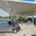 Woman reportedly pushed from vehicle at gas station