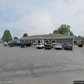 Officer with disabled vehicle in parking lot
