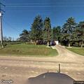 Person experiencing back pain near Sheridan Road