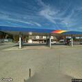Person ill in black Volvo at Seven Miles Drive gas station