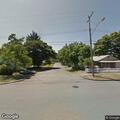 Complaint about person mowing grass at intersection