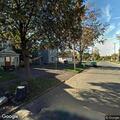 Police check vehicle behind Furman Street address
