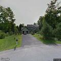 Residential alarm with garage door alert