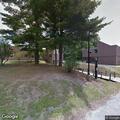 Person sick outside TSNHU Kingston Hall on River Road