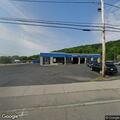 Report of man and woman fighting outside auto shop