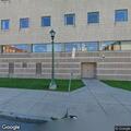 Unconscious man breathing at criminal courthouse