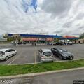 Man slumped unconscious in parked car at gas station