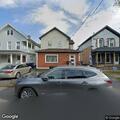 Person seen looking in windows on Emerson Ave