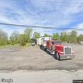 Man aged 43 vomits with abdominal pain at trucking compound