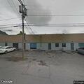 Damage to door handle at vacant smoke shop
