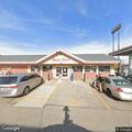Person possibly unresponsive in car at gas station