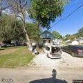 Brothers fighting at home in Woodman front yard
