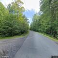 Erratic silver Jeep Compass reported on Thorndike Road
