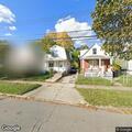 Complaint about abandoned blue vehicle at house
