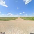 Report of hydraulic fluid hazard on Highway (number withheld) near 230th Street