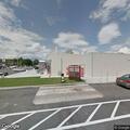 Small fire behind commercial building
