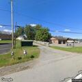 Barn collapse with downed wires in Mayfield