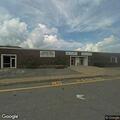Reckless blue sedan speeding near high school