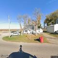 Male with severe back pain near 360th Street in Rock Valley
