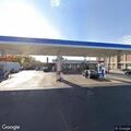 Female found slumped over in vehicle at gas station