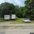 Tractor trailers block view at highway ramp merge