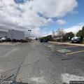 Suspicious person seen between vehicles at business