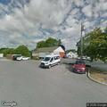 Vehicle hits light pole on Howard Road