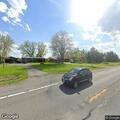 Man running and screaming in parking lot in Canastota