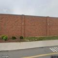 Person walking with groceries near Spencerport Road