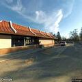 Elderly man experiencing breathing difficulty at fast food