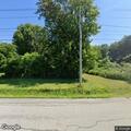 Report of erratic driving by blue jeep on Plank Road