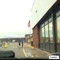 Officer checks two vehicles in parking lot