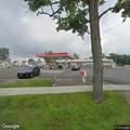 Man reportedly hitting woman in blue Nissan