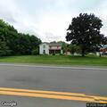 Traffic stop on gray GMC near Ridge Road home